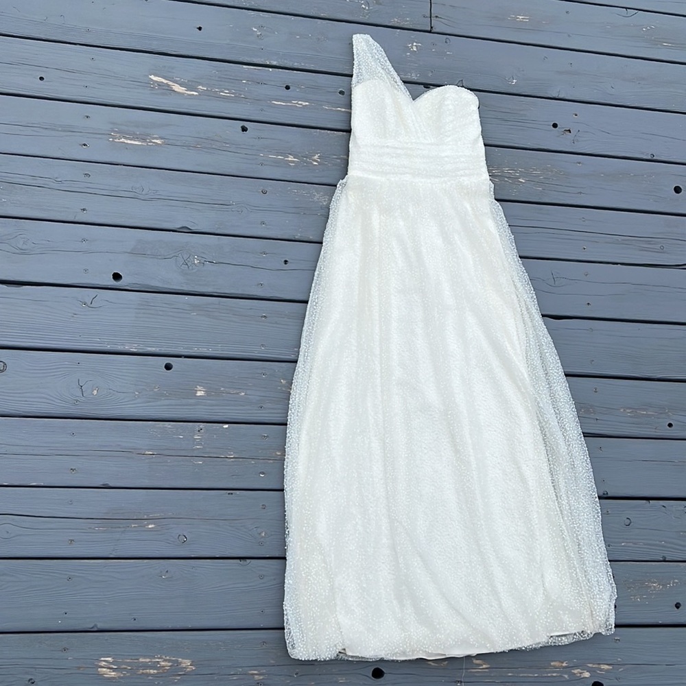 White sequined, one shoulder gown